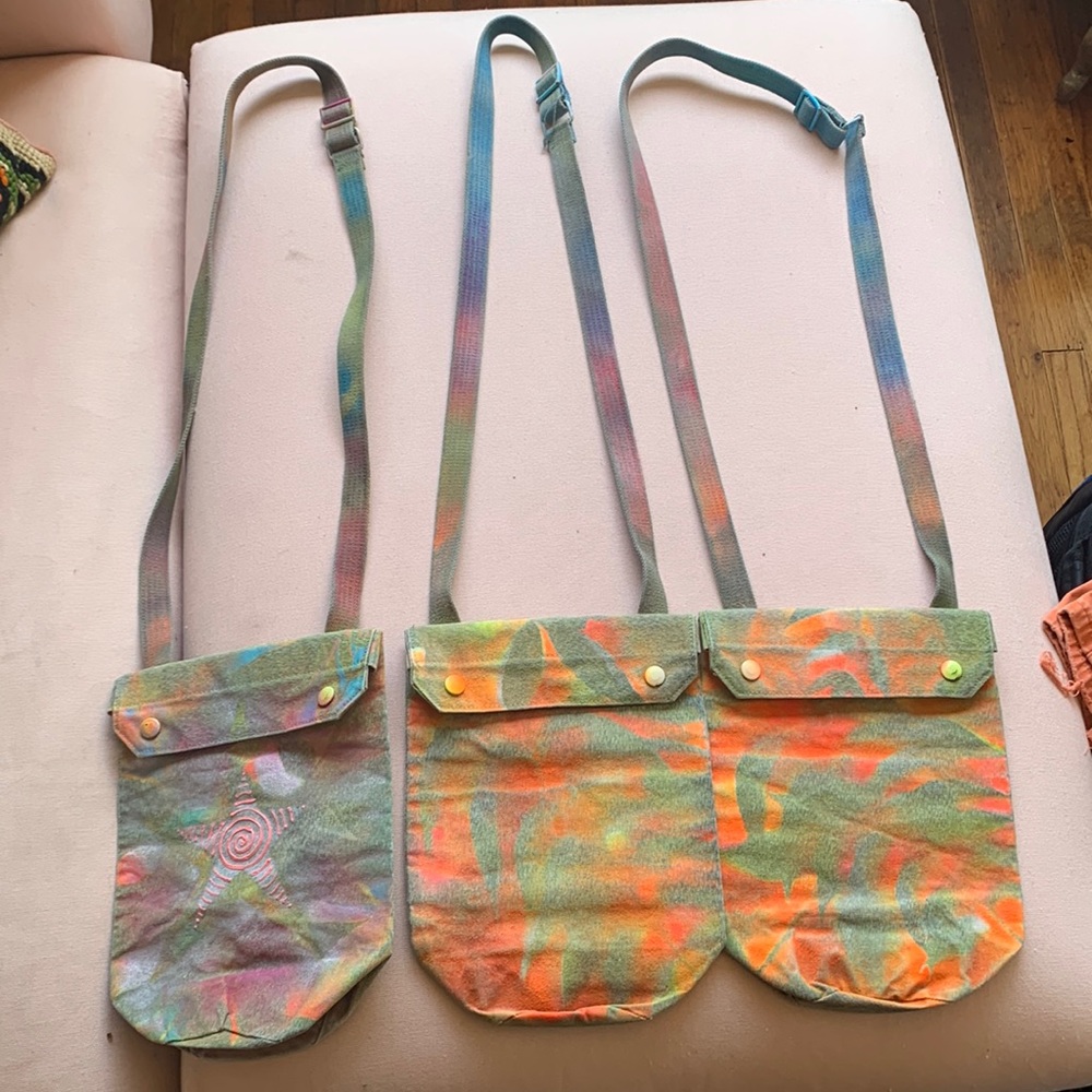 Reclaimed vintage army ammo bags, stencil & spray paint reworked